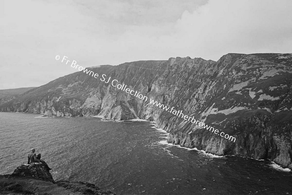 SLIEVE LEAGUE FROM BUNGLASS WITH MRS BYRNE IN FOREGROUND